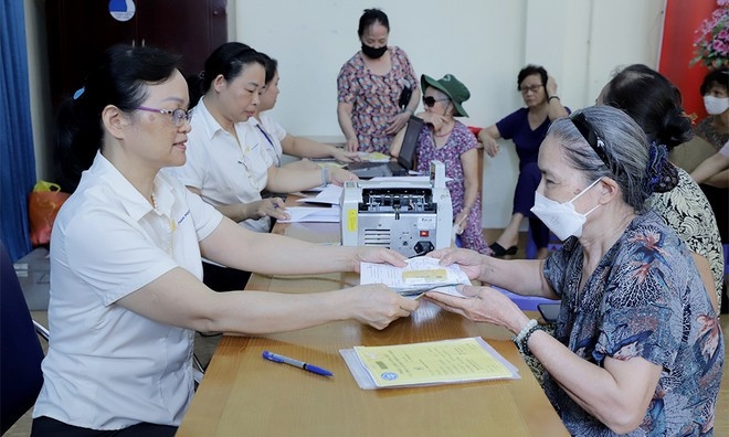 Bảo đảm 100% người đủ điều kiện được hưởng trợ cấp...